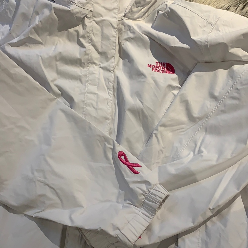The North Face Women’s White Lightweight Shell Jacket with Pink Ribbon